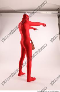 JOEL_ADAMSON CHRISTMAS VILLAIN WITH TWO GUNS